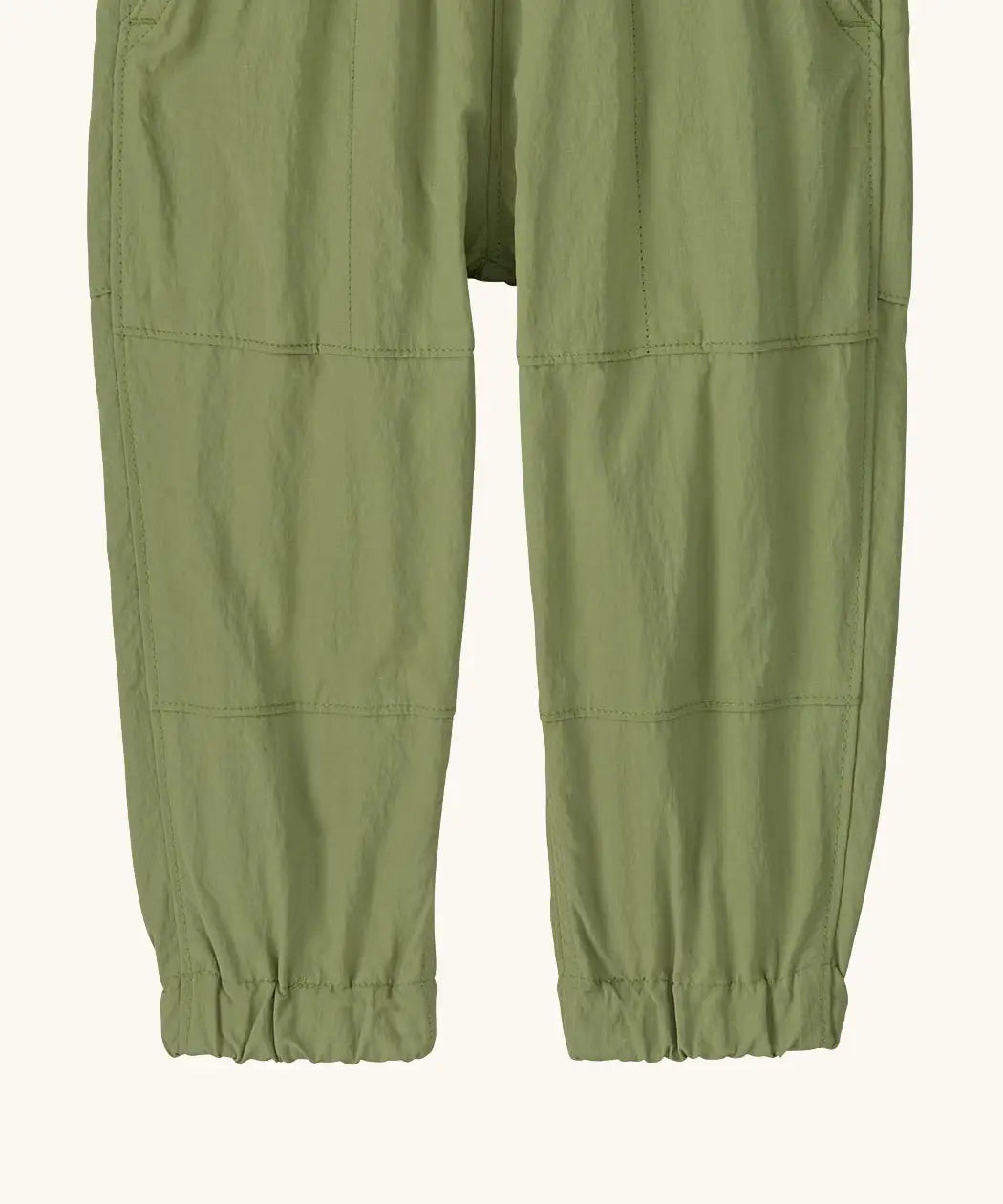 Patagonia recycled nylon little kids outdoor everyday pants in green showing elasticated leg cuffs