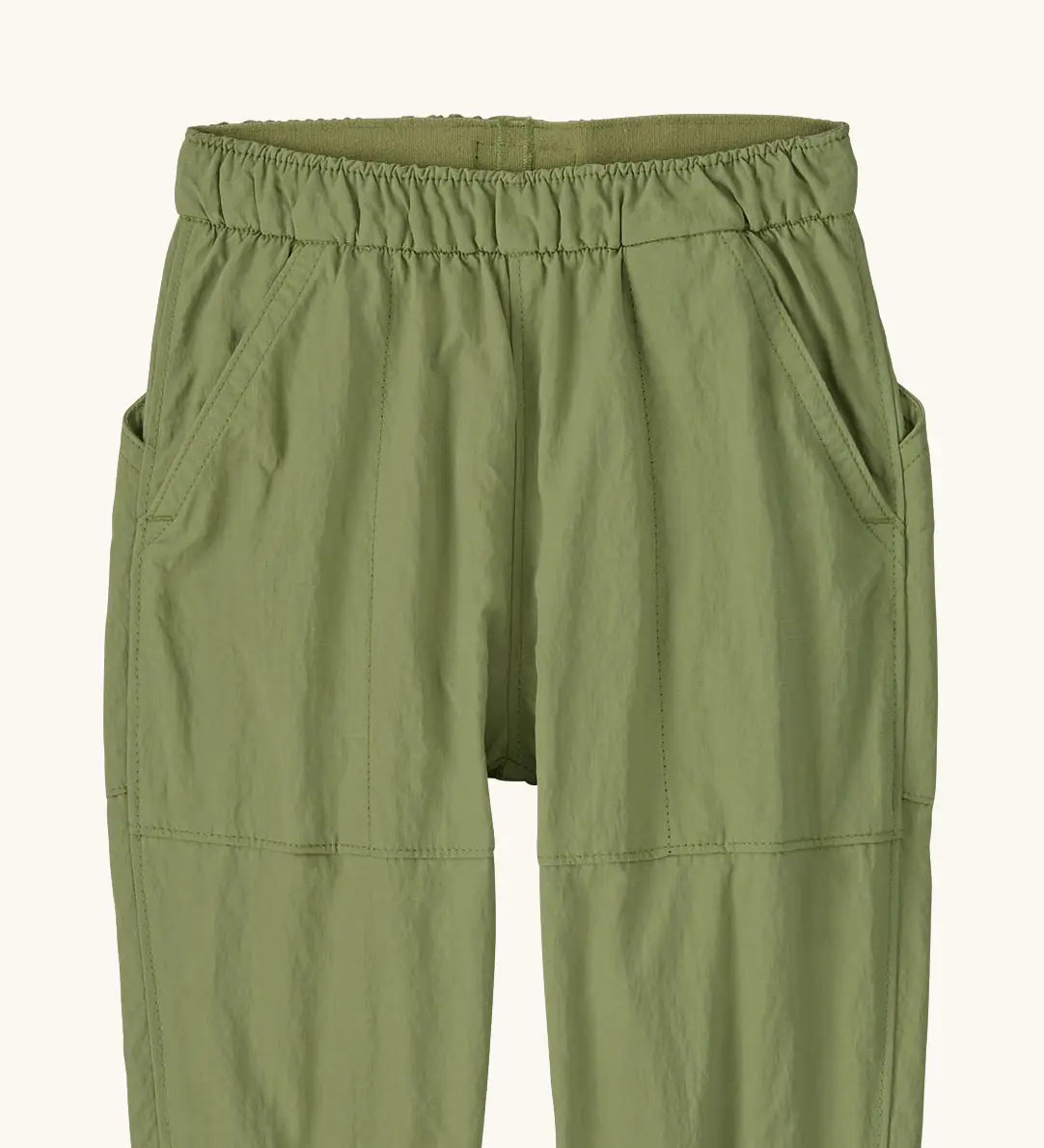 Patagonia recycled nylon little kids outdoor everyday pants in green showing elasticated waist band and side pockets