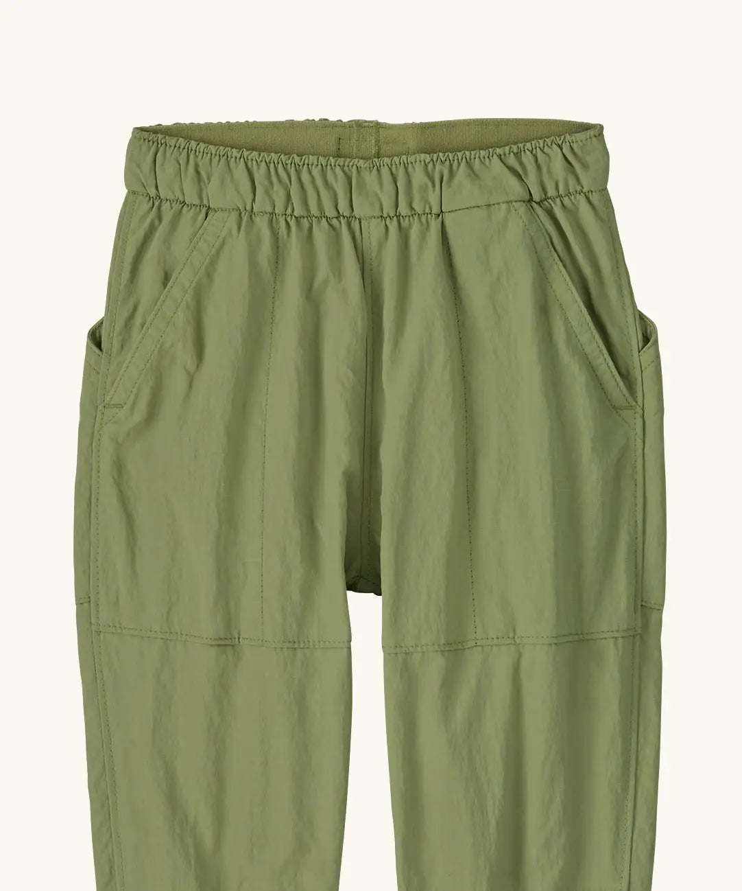 Patagonia recycled nylon little kids outdoor everyday pants in green showing elasticated waist band and side pockets