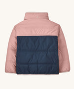 The back of a Patagonia Little Kids Reversible Tribbles Hoody shown with the hood off. Shown in a pink colour way