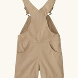 Patagonia Little Kids Stand Up Shortall dungarees in an dark cream showing back pockets and crossed shoulder straps
