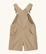Patagonia Little Kids Stand Up Shortall dungarees in an dark cream showing back pockets and crossed shoulder straps