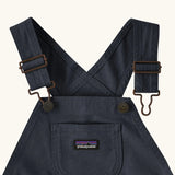 Patagonia Little Kids Stand Up Shortall dungarees in an navy showing small pouch chest pocket and hook & loop buckles