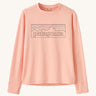 Patagonia kids long sleeve tshirt in a light pink colour with logo outline on a cream background.