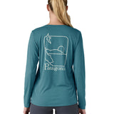 Patagonia women's long sleeve capilene top in turquoise beach outline design worn by a woman