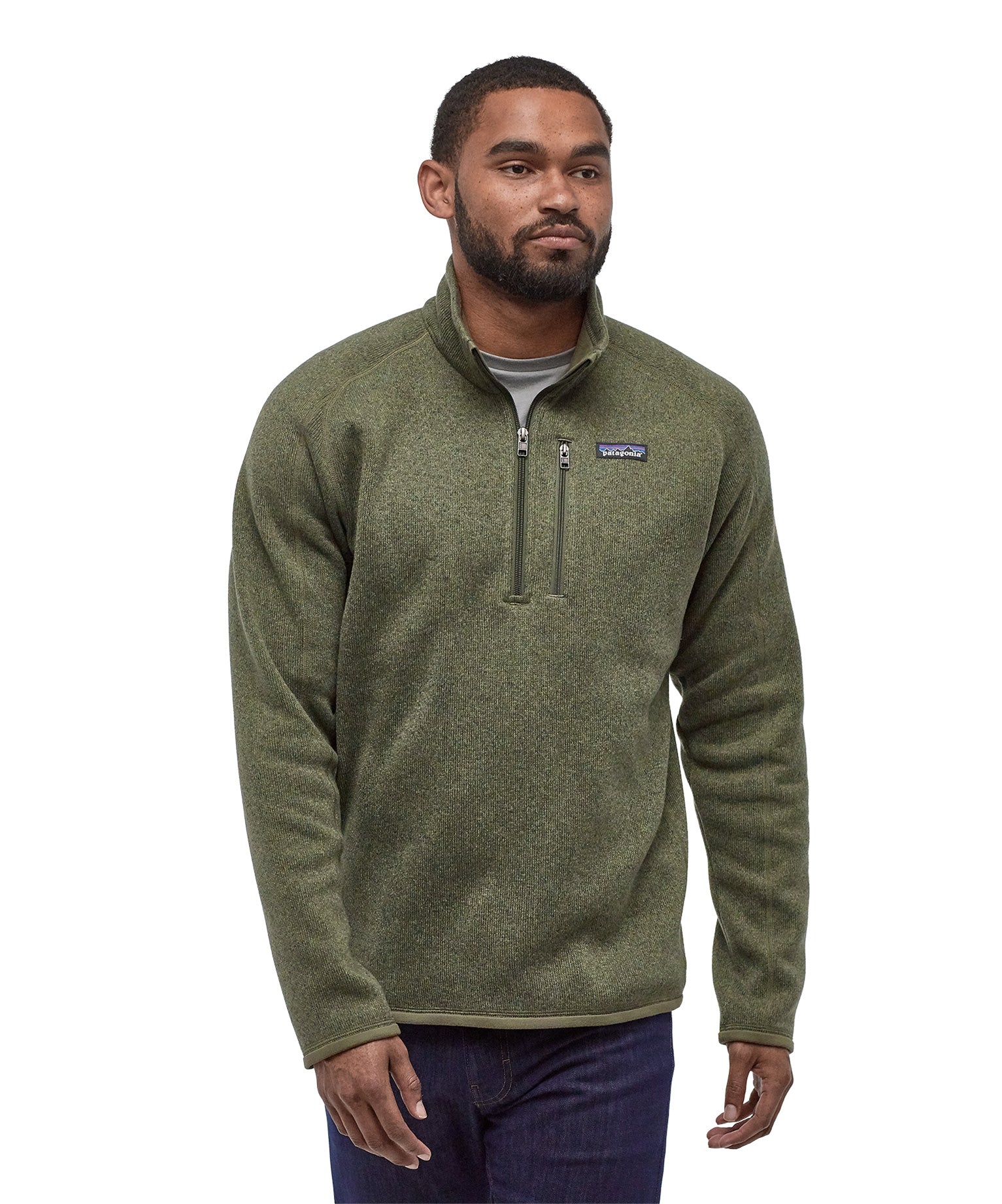 A man wearing the Patagonia Men's Better Sweater quarter Zip Industrial Green