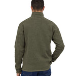 A man wearing the Patagonia Men's Better Sweater quarter Zip Industrial Green showing the back of the top