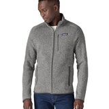 Close up of man stood up wearing the Patagonia stonewash better sweater jacket