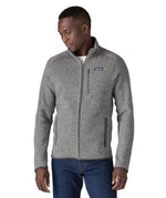 Close up of man stood up wearing the Patagonia stonewash better sweater jacket
