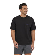 A man wearing a Patagonia Men's Boardshort Logo Pocket Responsibili-Tee Ink Black showing the front