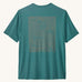 The Patagonia Men's Capilene Cool Daily Graphic Shirt with a Strataspire / Wetland Blue X-Dye design on a plain background. 