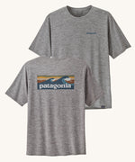 Patagonia Men's Capilene Cool Daily Graphic Shirt with a Waters / Feather Grey showing both sides of the t-shirt. 