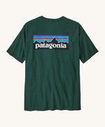 Patagonia men's logo responisbilli tee in cascade green. A short sleeve top in dark green with a large brand patch