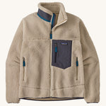 A Patagonia Men's Classic Retro-X Jacket in a Natural / Smolder Blue colour way on a plain background. 