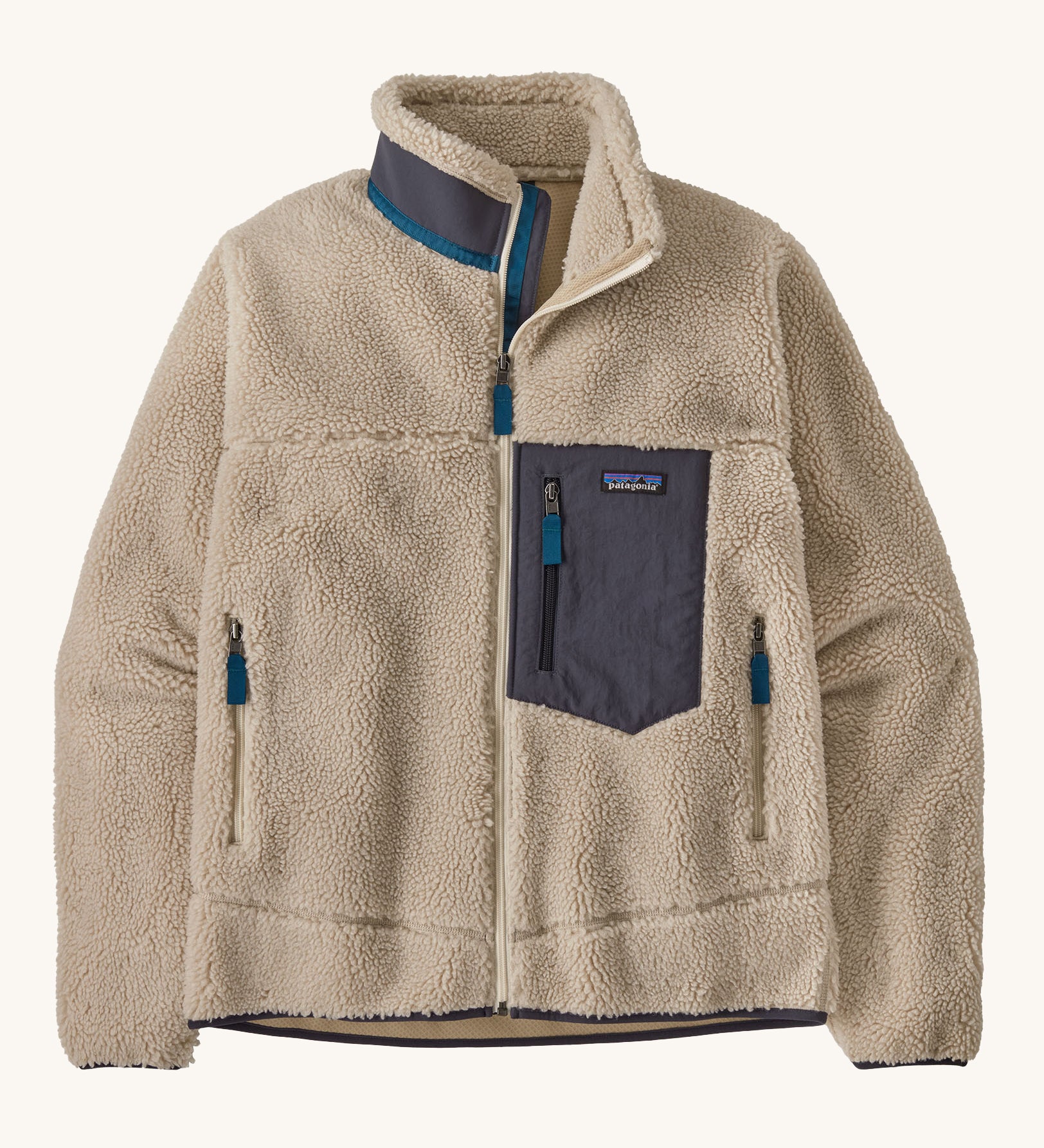 A Patagonia Men's Classic Retro-X Jacket in a Natural / Smolder Blue colour way on a plain background. 