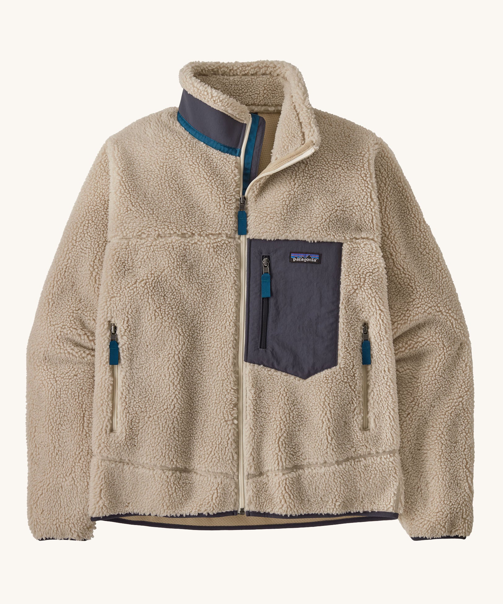 A Patagonia Men's Classic Retro-X Jacket in a Natural / Smolder Blue colour way on a plain background. 