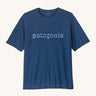 Patagonia Men's Capilene Cool Daily Graphic Shirt is a warm blue coloured top with short sleeves and the brand name printed across the chest. 