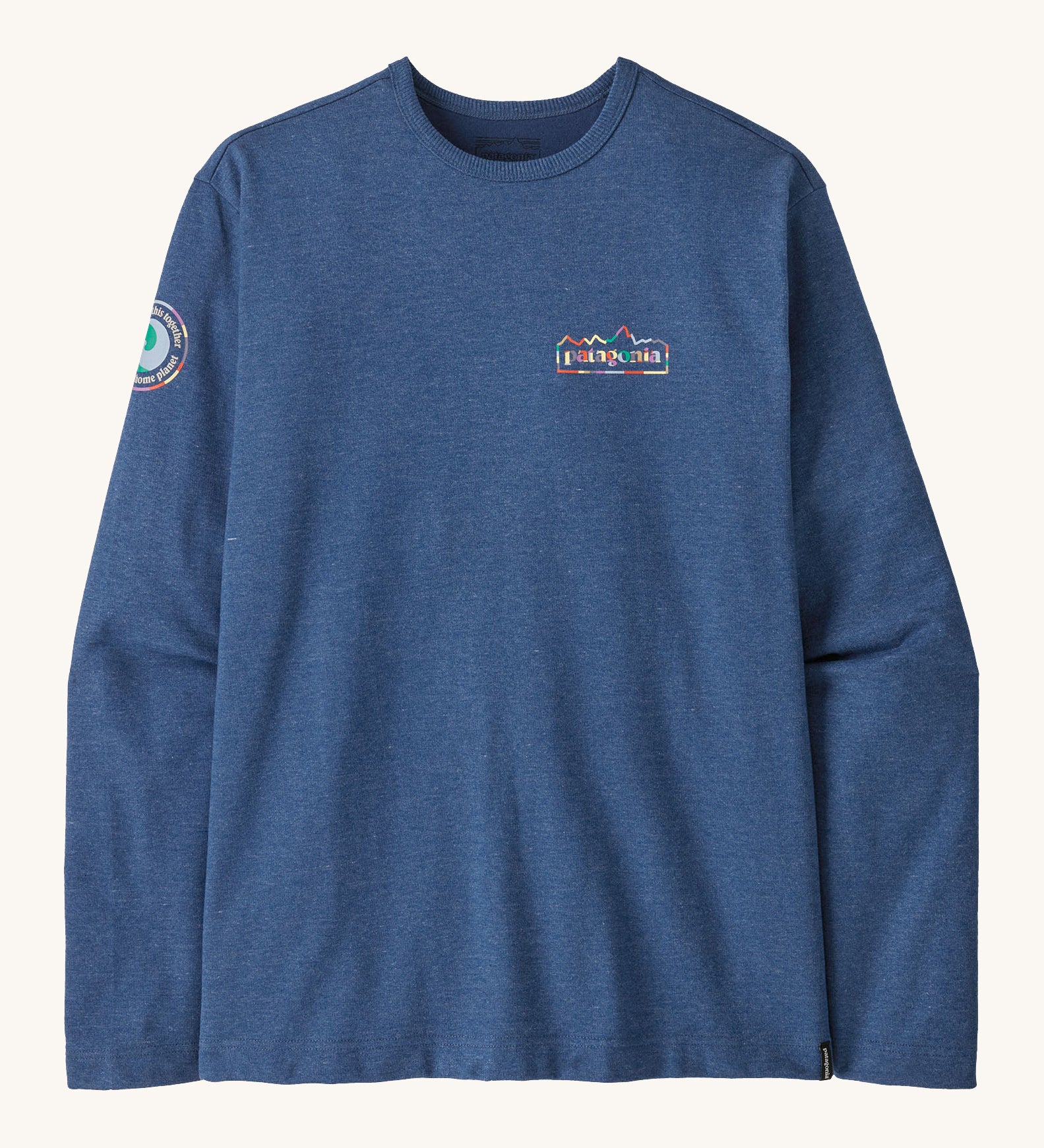 Patagonia men's unity fitz wildrise crew sweatshirt in clement blue. A lightweight long sleeve top with brand logo on the chest and a patch on the right shoulder