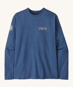 Patagonia men's unity fitz wildrise crew sweatshirt in clement blue. A lightweight long sleeve top with brand logo on the chest and a patch on the right shoulder