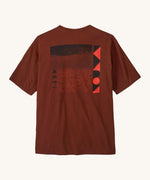 Patagonia mens driftways organic t-shirt. A cotton top in dark orange with a landscape and geometric patterns printed on the front.