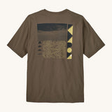 Patagonia mens driftways organic t-shirt. A cotton top in pale brown with a landscape and geometric patterns printed on the front.