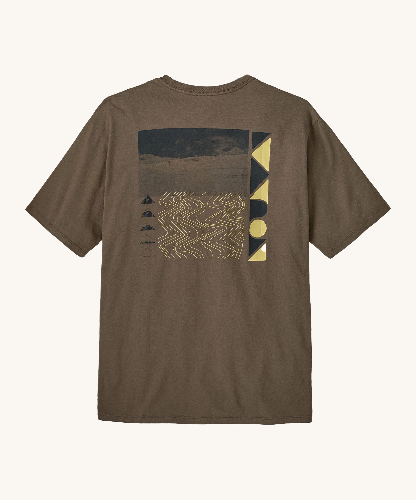 Patagonia mens driftways organic t-shirt. A cotton top in pale brown with a landscape and geometric patterns printed on the front.