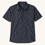 The Patagonia Men's Go To Shirt with  a Blossoms / New Navy design on a plain background. 