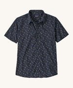 The Patagonia Men's Go To Shirt with  a Blossoms / New Navy design on a plain background. 