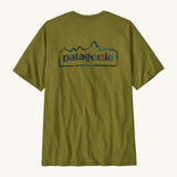 Patagonia men's unity fitz short sleeve top in a green colour on a cream background.