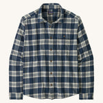 Patagonia men's lightweight flannel shirt in a new navy colour way on a cream background.
