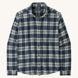 Patagonia men's lightweight flannel shirt in a new navy colour way on a cream background.