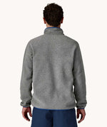 The back of a man wearing the Patagonia Men's Lightweight Synchilla® Snap-T Fleece Pullover in a grey colourway.