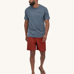 A person wearing Patagonia Men's Baggies Shorts Longs