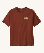Patagonia Men's 73 Skyline Organic T-Shirt. A brown top with short sleeves with a skyline style brand logo on the left chest area. 
This t-shirt is a part of a wide range of Patagonia clothing and accessories available here at Babipur. 