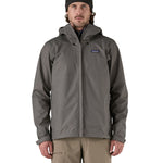 Patagonia men's 3 layer torrentshell rain jacket worn by a man 