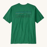 Patagonia men's short sleeve top in green logo outline design on a cream background.
