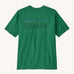 Patagonia men's short sleeve top in green logo outline design on a cream background.