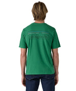 Patagonia men's short sleeve top in green logo outline design worn by a man back detail