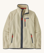 Patagonia men's retro pile jacket. A thick fleece in natural colour with a pale blue trim. Features a full length zip, 2 side pockets, a chest pocket and the logo patch stitched above