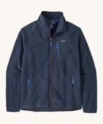 Patagonia men's retro pile fleece jacket in sunken blue colour. A thick dark blue fleece with a full length zip, 2 side pockets and a chest pocket with the brand patch stitched on the chest.