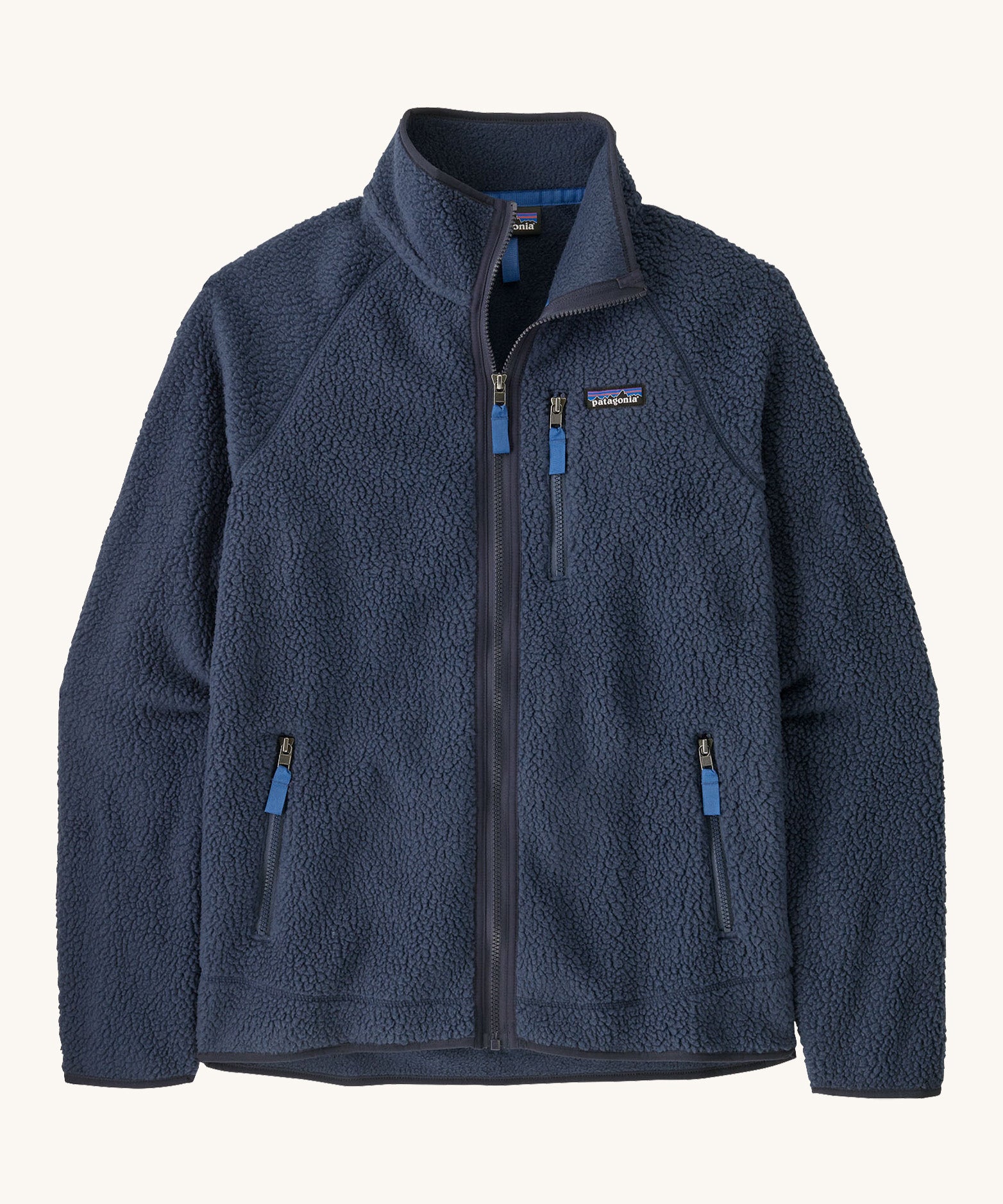 Patagonia men's retro pile fleece jacket in sunken blue colour. A thick dark blue fleece with a full length zip, 2 side pockets and a chest pocket with the brand patch stitched on the chest.