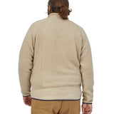 The view of a man's back wearing a Patagonia Men's Retro Pile Jkt in a cream colour