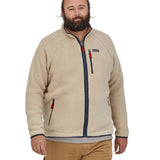 A man wearing the Patagonia Men's Retro Pile Jkt in a cream colour