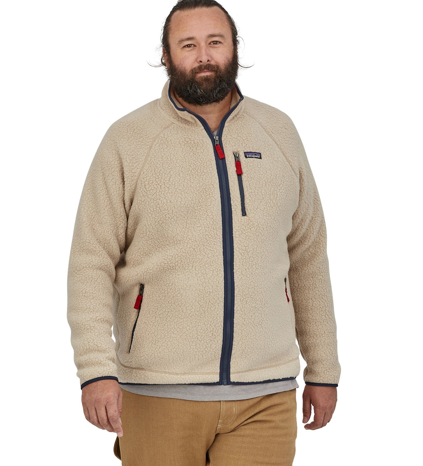A man wearing the Patagonia Men's Retro Pile Jkt in a cream colour