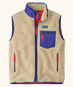 retro x patagonia vest, gilet bodywarmer style with no arms, cream fleece, blue contrasting pockets and red zip detail