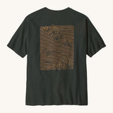 Patagonia men's  Strataspire tee in old growth green is a short sleeve top with a big mountain scape print in pale orange on the back 