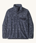 Patagonia mens synchilla jacket. A lightweight fleece in dark blue colour with a white flowing pattern all over. Features a chest pocket, logo patch stitched above and a 1/4 length popper fastener.