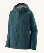 Patagonia men's 3 layer torrentshell rain jacket in teal on a cream background.