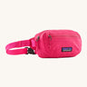 Patagonia Terravia Mini Hip Pack in a  luminous pink colour on a cream background