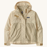 Patagonia women's skysail jacket in a natural colour on a cream background